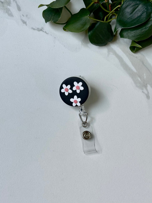 Black Daisy Badge Reel